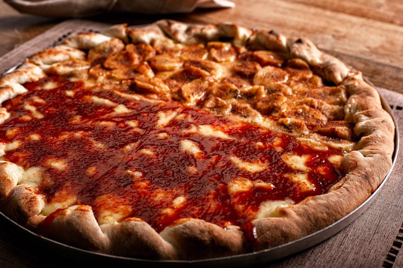 Four cheese pizza with golden crust