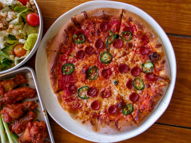 Spicy pepperoni pizza with chili oil